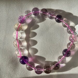 Super 7 Crystal Vibrant Purple and Clear Beaded Bracelet